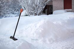 a shovel at the midst of snow